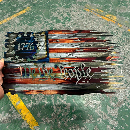 Distressed metal American flag art with 1776 and We The People text in rustic patriotic design